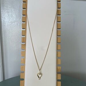 Elegant Gold Pendant Necklace with baby blue stone